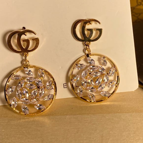 Jewelry - Women’s gold toned costume jewelry stainless steel earings